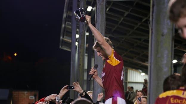 Bill Cooper holds aloft the Cork PIHC trophy in 2013 