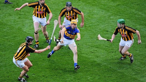 Pa Bourke, Tipperary, is surrounded by Kilkenny players, left to right, Jackie Tyrrell, Brian Hogan, Noel Hickey, and Paul Murphy in the 2011 All-Ireland SHC Final.  