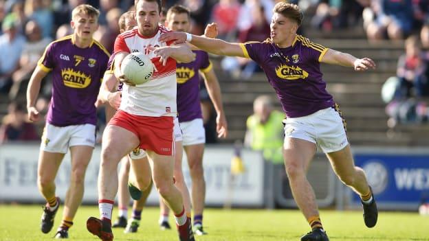 Ryan Bell of Derry in action against Eoin Porter of Wexford during the GAA Football All-Ireland Senior Championship Round 1 match between Wexford and Derry at Innovate Wexford Park in Wexford. 