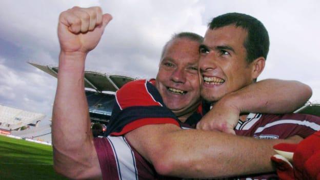 Dessie Dolan celebrates with manager Páidí Ó Sé after helping Westmeath to victory over Wexford in the 2004 Leinster SFC semi-final. 