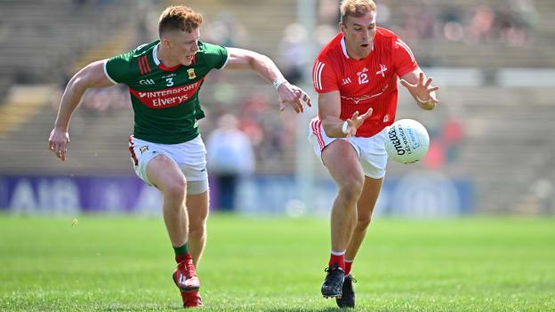 Conor Grimes, Louth, and David McBrien, Mayo, in All-Ireland SFC action. Photo by Seb Daly/Sportsfile