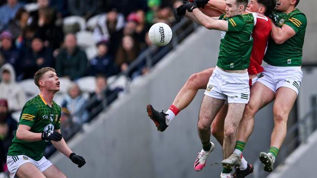 Colm O'Callaghan of Cork in action against Meath players Ronan Jones, right, and Cathal Hickey as Mathew Costello, far left, looks on during the Allianz Football League Division 2 match between Cork and Meath at Páirc Ui Chaoimh in Cork. 