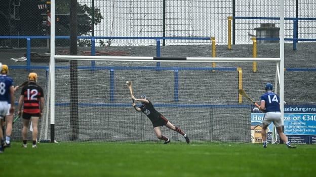 Ballygunner goalkeeper Stephen O'Keeffe saves a penelty from Austin Gleeson, 14, of Mount Sion during the 2022 Waterford County Senior Hurling Championship Final match between Mount Sion and Ballygunner at Walsh Park in Waterford.