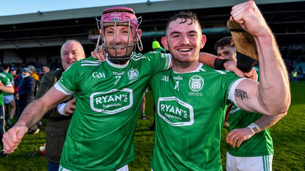 Kilmallock players Paudie O'Brien, left, and Oisín O'Reilly celebrate after their side's victory in the Limerick County Senior Club Hurling Championship Final match between Kilmallock and Patrickswell at TUS Gaelic Grounds in Limerick. 