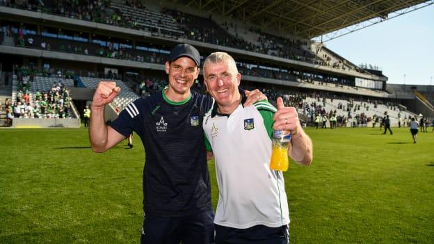Limerick manager, John Kiely, right, and coach Paul Kinnerk pictured after their 2021 Munster SHC Final victory over Tipperary. 