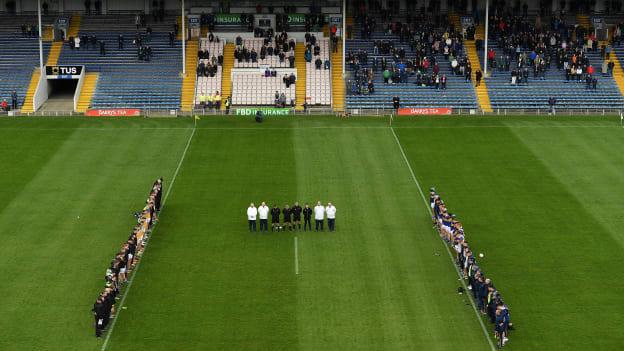 Referee James Molloy, his officials and members of both squads and management, stand during a minutes silence to honour the late Liam Kearns before the Allianz Football League Division Three match between Tipperary and Offaly this afternoon. 