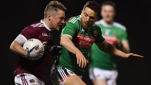 Mayo's Chris Barrett in action against Danny Cummins of Galway in this year's Allianz Football League. 