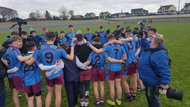 The St Michael's, Enniskillen players huddle up after MacRory Cup semi-final victory over St Patrick's Maghera.