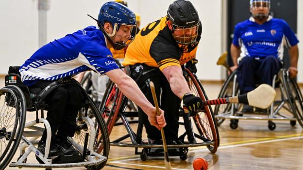 Cian Horgan of Munster in action against Ciarán Bradley of Ulster during the M.Donnelly GAA Wheelchair Hurling / Camogie All-Ireland Finals 2022 match between Ulster and Munster at Ashbourne Community School in Ashbourne, Meath. Photo by Eóin Noonan/Sportsfile.