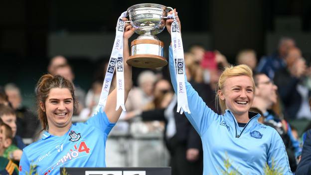Dublin's Niamh Collins and Carla Rowe lift the Mary Ramsbottom Cup after the Leinster LGFA Senior Football Championship Final match beween Meath and Dublin at Croke Park in Dublin.