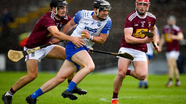 Patrick Curran, Waterford, and Aonghus Clarke, Westmeath, collide at Walsh Park.