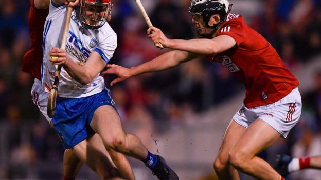 Carthach Daly of Waterford is tackled by Darragh Fitzgibbon, left, and Ger Millerick of Cork during the Allianz Hurling League Division 1 Final match between Cork and Waterford at FBD Semple Stadium in Thurles, Tipperary.