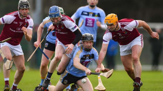 Seán Carey of UCD in action against NUI Galway players, from left, Andrew Geaney, Pat Monaghan, and Paul Hoban during the Electric Ireland Fitzgibbon Cup Round 1 match between University College Dublin and NUI Galway at Billings Park in UCD, Belfield, Dublin. 