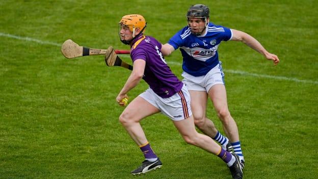 Simon Donohoe, Wexford, and PJ Scully, Laois in Allianz Hurling League action.