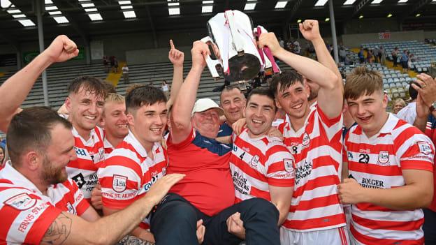 Ferns St Aidan's manager Pat Bennett celebrates with his team and the trophy after the Wexford County Senior Hurling Championship Final match between St Martin's and Ferns St Aidan's at Chadwicks Wexford Park in Wexford.