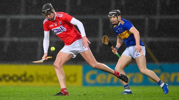 Robert Downey, Cork, and Alan Flynn, Tipperary, in action at the LIT Gaelic Grounds.