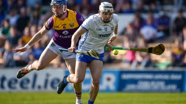 Dessie Hutchinson, Waterford, and Kevin Foley, Wexford, during Sunday's Allianz Hurling League semi-final at UPMC Nowlan Park.