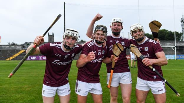 Galway players, from left, Conor Slattery, Tiernan Leen, Michael Walsh and Shane Morgan celebrate after the 2020 Electric Ireland GAA All-Ireland Hurling Minor Championship Semi-Final match between Limerick and Galway at Cusack Park in Ennis, Clare.