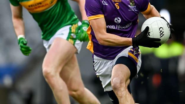 Rory O'Carroll, Kilmacud Crokes, and Emmett Bradley, Glen, in action during the AIB All-Ireland Club SFC Final at Croke Park.