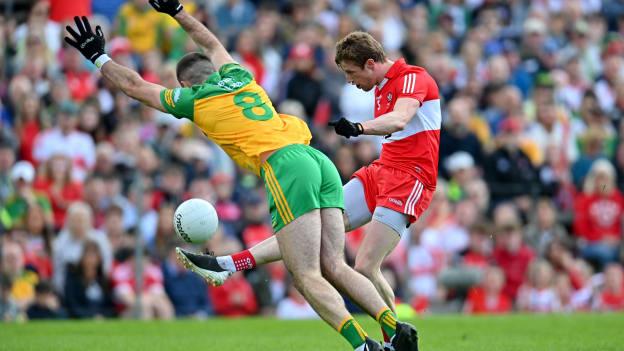 Brendan Rogers, Derry, and Caolan McGonagle, Donegal, in action during the Ulster SFC Final.