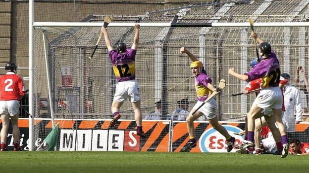 Wexford's Michael Jordan, (centre) celebrates after scoring Wexford's second goal with teammate Michael Jacob (12) against Cork in the drawn 2003 All-Ireland SHC semi-final. 