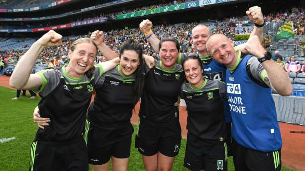 Kerry management, from left, mentor Geraldine O'Shea, sports psychollogist Michelle O'Connor, mentor Anna Maria O'Donoghue, strength and conditioning coach Cassandra Buckley, and joint-managers Declan Quill and Darragh Long, right, celebrate after the TG4 All-Ireland Ladies Football Senior Championship Semi-Final match between Kerry and Mayo at Croke Park in Dublin.