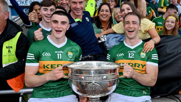 Kenmare shamrocks clubmates Seán O'Shea, left, and Stephen O'Brien of Kerry celebrate with family and friends and the Sam Maguire cup after the GAA Football All-Ireland Senior Championship Final match between Kerry and Galway at Croke Park in Dublin. 