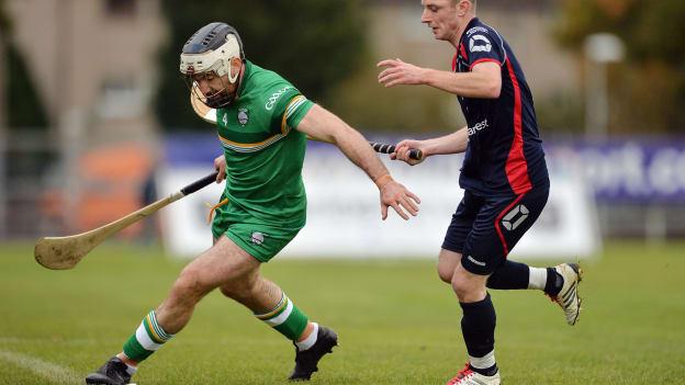 Mickey Burke, Ireland, and Kevin Bartlett, Scotland, in action during the 2016 Senior Hurling/Shinty International Series at Bught Park, Inverness. Photo by Piaras Ó Mídheach/Sportsfile