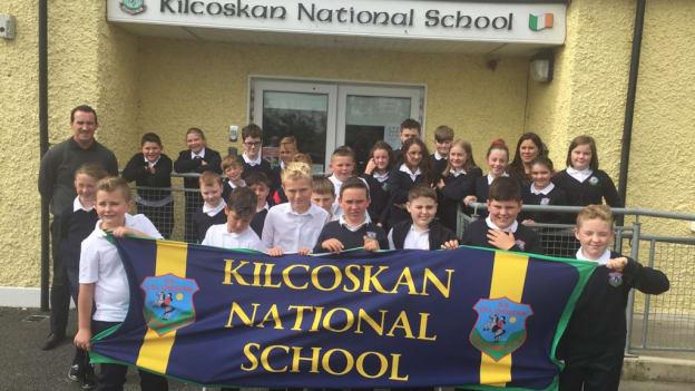 Kilcoskan National School Principal Paddy Christie and Deputy Principal Patricia Finnegan pictured with fifth and sixth class students.