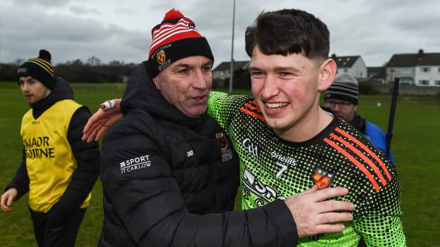 Niall Brassil of IT Carlow is congratulated by IT Carlow manager DJ Carey following the Fitzgibbon Cup Semi-Final match between Mary Immaculate College Limerick and IT Carlow at Dublin City University Sportsgrounds. 