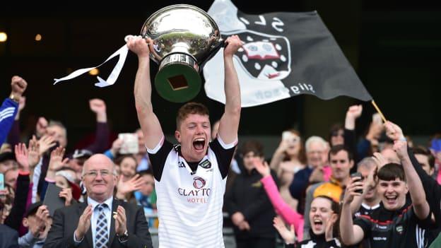 Easkey clubman, James Weir, lifts the Nickey Rackard Cup for Sligo in 2019.