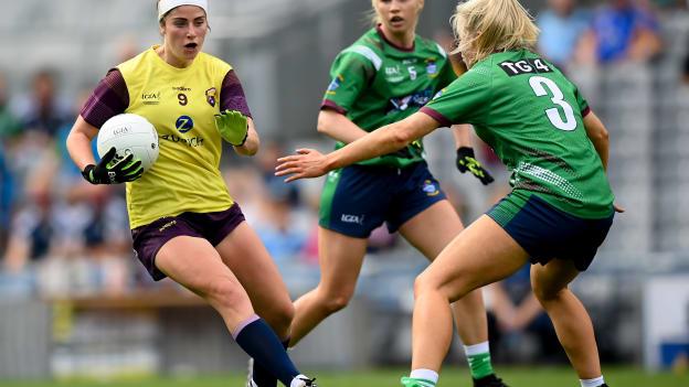 Róisín Murphy of Wexford in action against Lorraine Duncan of Westmeath during the TG4 All-Ireland Ladies Intermediate Football Championship Final match between Westmeath and Wexford at Croke Park in Dublin. 