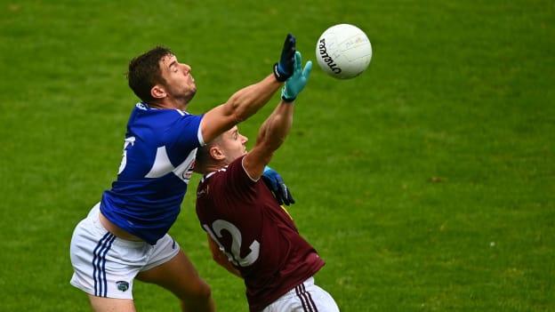Colm Begley, Laois, and David Lynch, Westmeath, in Leinster Senior Football Championship action.