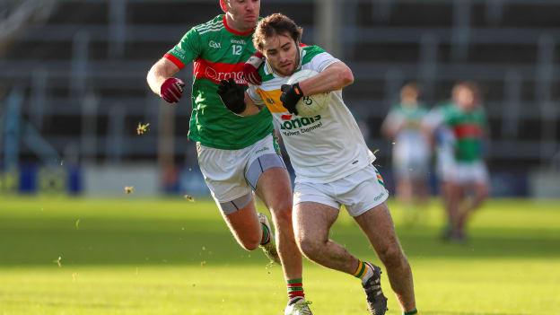 Ross Peters, Clonmel Commercials, and Noel McGrath, Loughmore-Castleiney, during the Tipperary SFC Final.