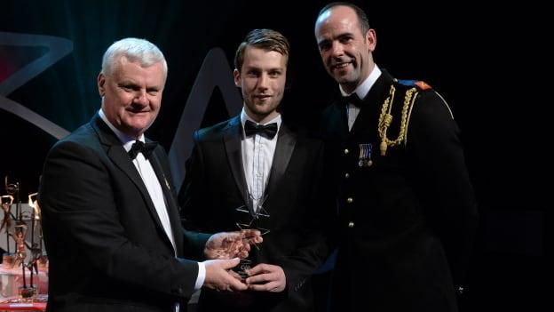 Dermot Begley, Tyrone, receives his Nicky Rackard Champions 15 Award from Uachtarán Chumann Lúthchleas Gael Aogán Ó Fearghail, in the company of Dermot Earley, GPA President, at the GAA GPA All-Star Awards 2015 Sponsored by Opel. 