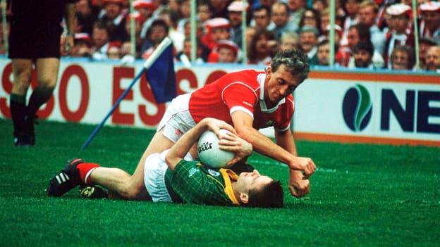 Conor Counihan of Cork in action against Bernard Flynn of Meath during the 1990 All-Ireland Senior Football Championship Final between Cork and Meath at Croke Park in Dublin. 