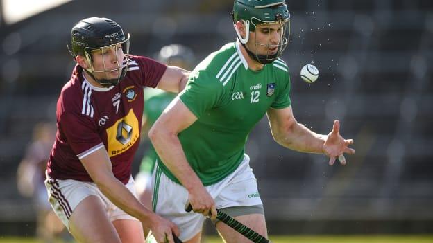 Brian Ryan, Limerick, and Liam Varley, Westmeath, in Allianz Hurling League action at the LIT Gaelic Grounds.