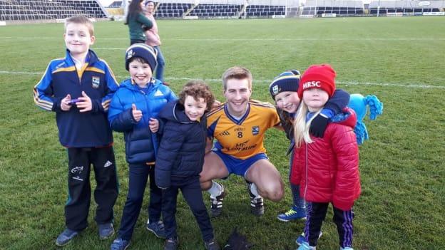 Beaufort captain, Nathan Breen, pictured with some of the club's younger supporters after victory over Dundalk Young Irelands in the AIB All-Ireland Club Junior Football Semi-Final. 