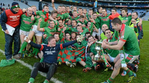 The St. Brigid's players celebrate with the Andy Merrigan Cup after victory over Ballymun Kickhams in the 2013 AIB All-Ireland Club SFC Final. 