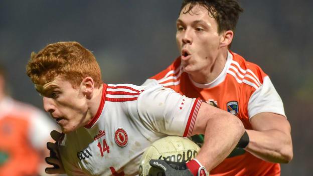 Peter Harte, Tyrone, and James Morgan, Armagh, in action during the Bank of Ireland Dr McKenna Cup Final.