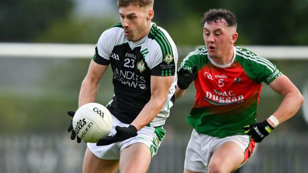 Sean O'Leary, right, in action for Kilcummin in the 2020 Kerry Senior Club Football Championship. 