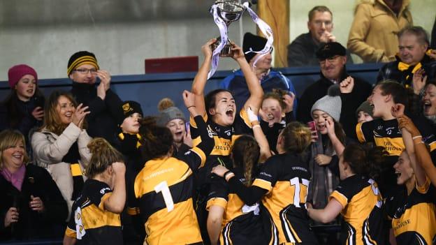 Brid O'Sullivan of Mourneabbey lifts the Dolores Tyrrell Memorial Cup following the All-Ireland Ladies Football Senior Club Championship Final match between Mourneabbey and Foxrock-Cabinteely at Parnell Park in Dublin. 