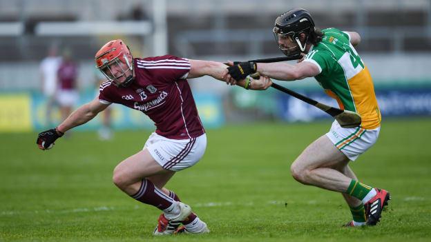 Conor Whelan, Galway, and Ben Conneely, Offaly, collide during the 2018 Leinster Senior Hurling Championship.