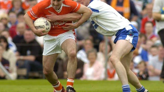 Monaghan's Vinny Corey tackles Armagh's Martin O'Rourke in the 2004 Ulster SFC. 