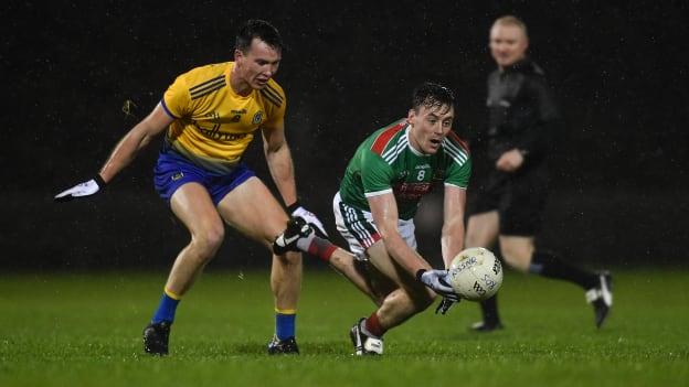 Tadhg O'Rourke, Roscommon, and Diarmuid O'Connor, Mayo, collide during an Allianz Football League encounter in January.