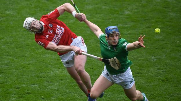Mike Casey of Limerick in action against Patrick Horgan of Cork during the Munster GAA Hurling Senior Championship Round 1 match between Cork and Limerick at Páirc Uí Chaoimh in Cork. 