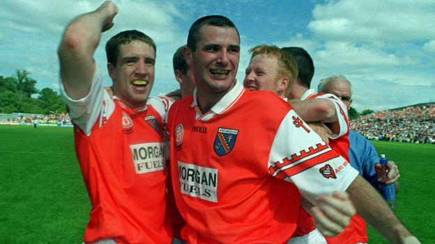 Kieran McGeeney and Steven McDonnell celebrate after the 2000 Ulster SFC Final at St Tiernach's Park.