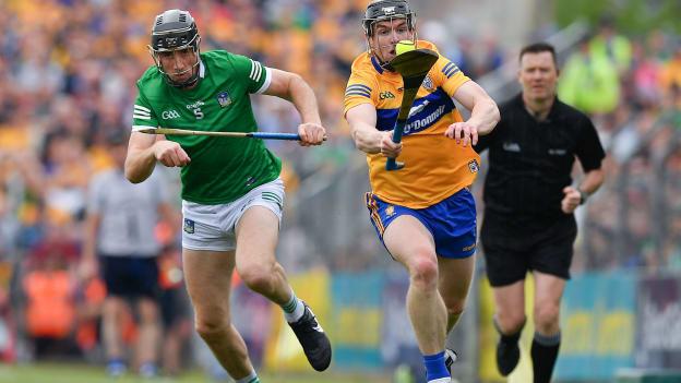 Tony Kelly of Clare is tackled by Diarmaid Byrnes of Limerick during the Munster GAA Hurling Senior Championship Round 4 match between Clare and Limerick at Cusack Park in Ennis, Clare. 