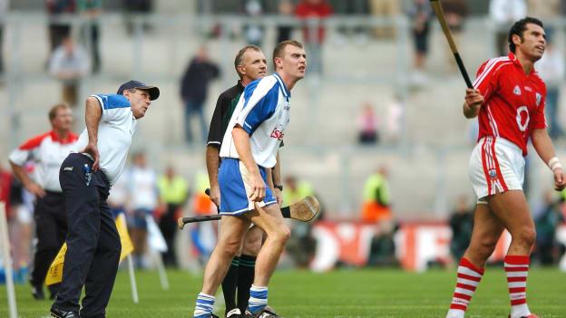 Waterford's Eoin Kelly, 3rd from left, along with his manager Justin McCarthy, left, linesman Dickie Murphy and Sean Og O hAilpin, watch as Kelly's late chance of a point goes wide.