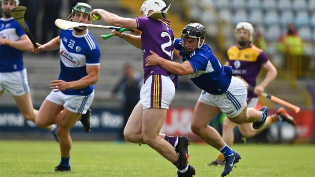 Rory O'Connor of Wexford is fouled by Lee Cleere of Laois resulting in a penalty for Wexford and a yellow card and sin binning for Cleere during the Allianz Hurling League Division 1 Group B Round 1 match between Wexford and Laois at Chadwicks Wexford Park in Wexford. 